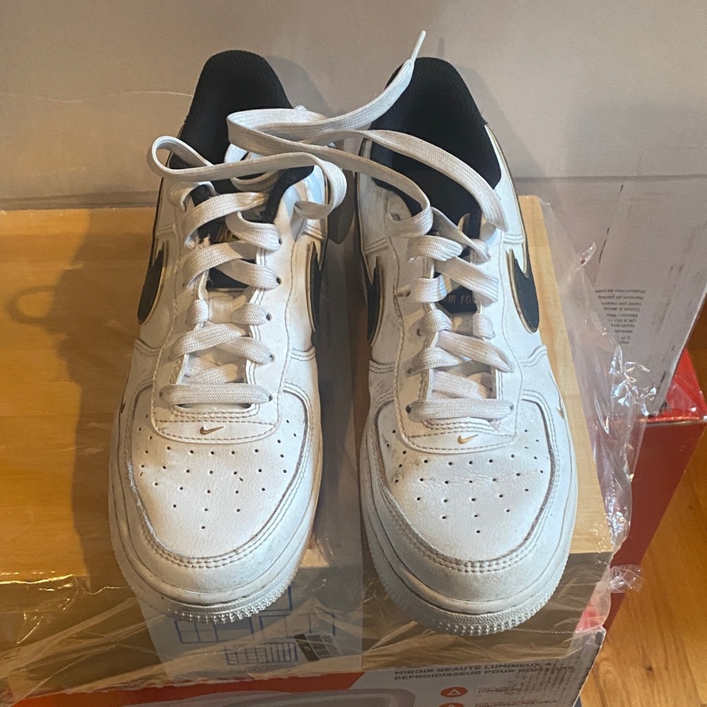 Nike White Sneakers with Black Swoosh
